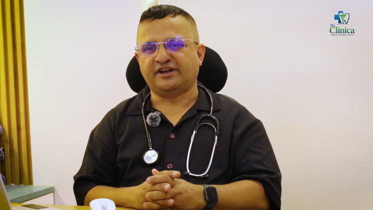 Dr. Santosh explaining treatment at The Clinica